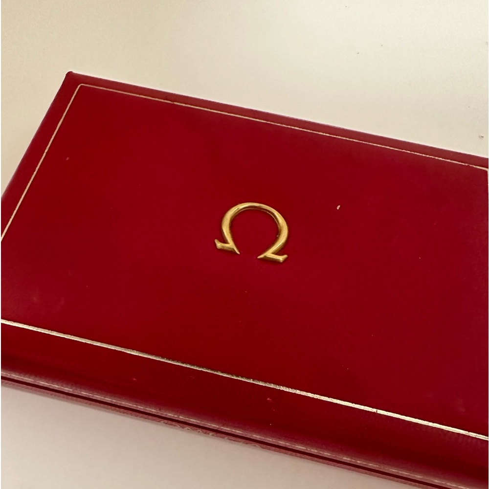 Omega 14k gold